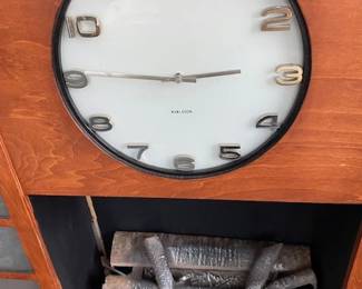 Art Deco Streamline Fireplace Mantel with faux fire.