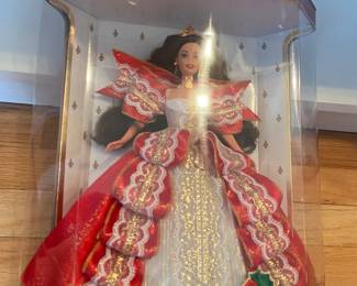 Several Barbie dolls in original boxes.