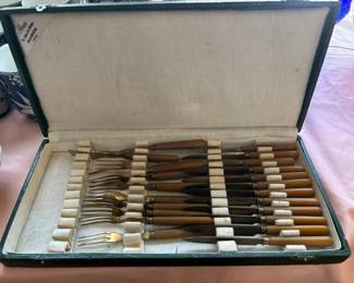 Vintage Bakelite utensils in case.