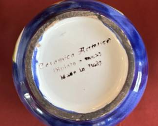 Assorted hand-painted mugs from Italy.