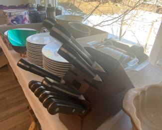 Knife set in block and kitchen items.