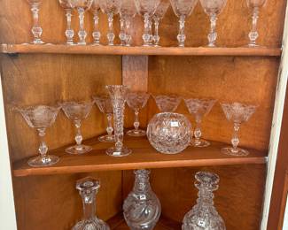 Collection of crystal stemware & decanters