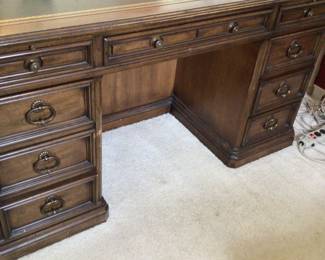 Leather inlaid executive desk. $125