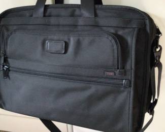 TUMI Like new extra large expandable travel bag $475