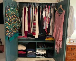 Floral painted armoire, women's clothing