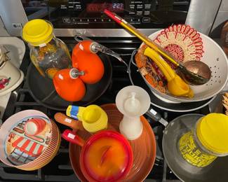 Pots,  Pans, Pyrex juice pitcher, Tupperware measuring cups, Tupperware peppermill, Tortilla warmer