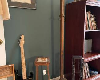 Floral tile table, Davison electric guitar, Coat rack, CD rack, Bookshelves
