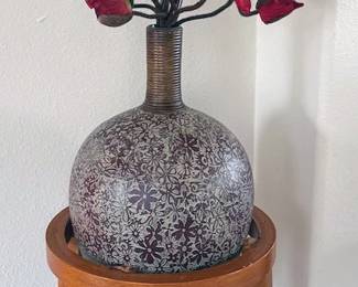 Vase with floral arrangement