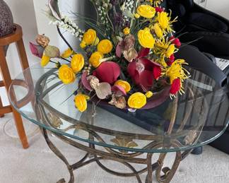 Faux floral arrangement + glass side table