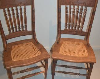 antique caned seated chairs