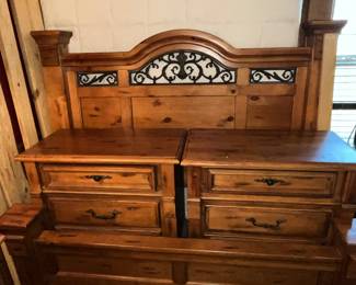 Iron accented queen size bed and 2 large bedside cabinets!