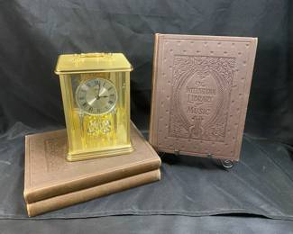 Rotating Pendulum Clock Three Vintage International Library Of Music Books