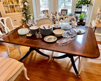 Mahogany table w/2 leaves and pads - can sit 12 but I have had 14 people seated at table -table is wide enough to sit 2 people at each end if needed 