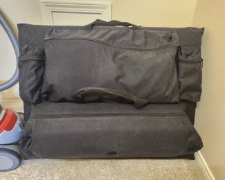 Earth Life Massage table and cushions in travel bag.
