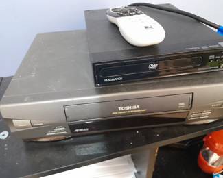 Working VHS and DVD Player with assorted movie disc $50.00