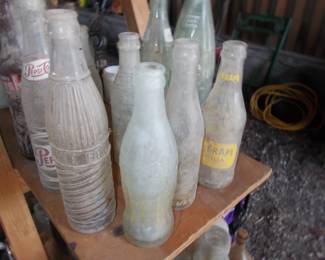 Soda bottles, several bottled in Temple and Austin