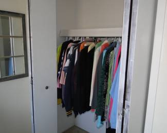 Another closet filled with women's clothing