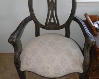 Closer version of the lone chair, which is really comfortable, especially when you sit down in it, and take pictures of what is inside the closet 