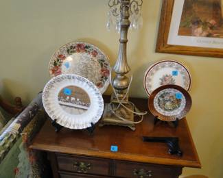 Decorative plates, and a lamp with the cord wrapped around the base
