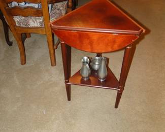 Yes, those are three pewter pieces.  But that side table that tucks away nicely in the corner, actually becomes round, imagine that!!!