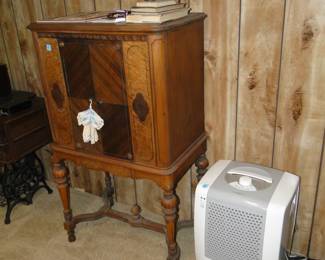 We have all kinds of wonderful items.  Like the dehumidifier.  Or that wonderful cabinet that is great for storage, or would make an outstanding bar