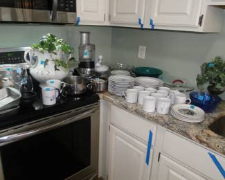 A nice collection of dishes, platters and plates