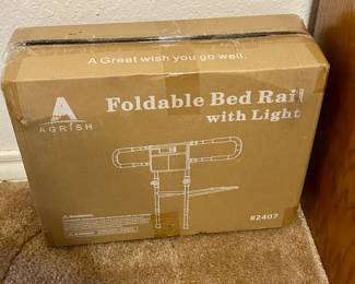 new in box foldable bed rail with light