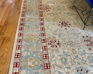 This handcrafted Oushak style rug, celebrated for their subtle elegance and harmonious patterns. Skillfully made by adept artisans, the rug showcases soft hues that bring a sense of tranquility and understated sophistication to any contemporary interior. Its distinctive floral motifs and serene color palette of creamy beiges, blues, and pops of terracotta effortlessly anchor a room with a touch of historical artistry.