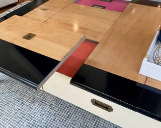 Grange coffee table with drawers and articulating trays.
