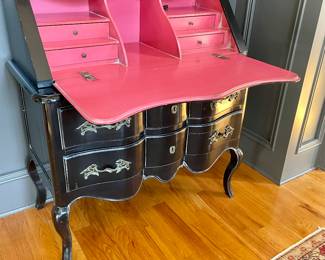 Grange Scribean Desk with pink interior - Timeless and Elegant.
This stunning piece boasts a gracefully slant top that opens to reveal a beautifully crafted writing surface, and is adorned with cabriole legs, gently undulating curves, and intricate detailing and rich finishes, showcasing the craftsmanship of a bygone era.
