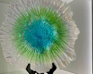 Blenko glass piece. This piece beautiful example of their artistry, showcasing their signature iridescent glass and distinctive organic shapes.