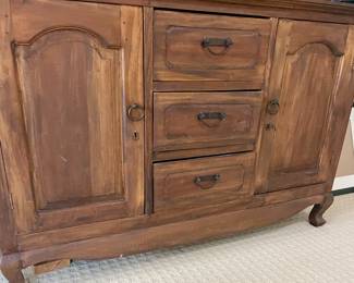 Sideboard with three drawers and two doors