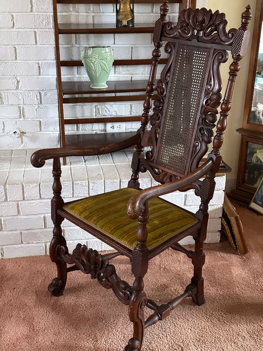 Antique European carved arm chair.