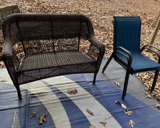 Outdoor wicker bench,pair of chairs, area rug