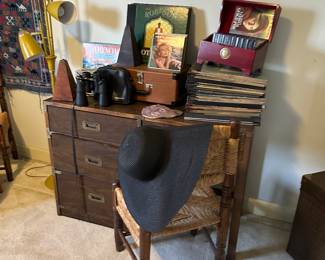 Circa 1970 style desk,dresser, chest, nightstand, vinyl records, binoculars, metronomes, and more