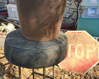 metal bucket and railroad stool; stop sign