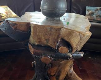 cedar stump coffee table and brass spitoon