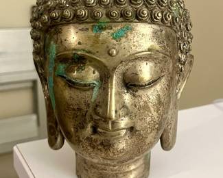 Bronze Buddha head with verdigris