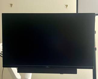 Attached to thos Dell Monitor is a multimedia speaker