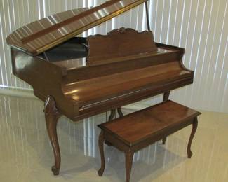 Beautiful Howard (Baldwin) Satin Walnut Baby Grand Piano w/bench, EXCELLENT condition!  The homeowner has taken extraordinary care and has had it tuned and maintained every six months.  Priced at $1,000 / OBO.  Please contact us for a viewing. 