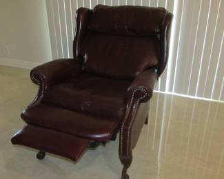 Leather nailhead reclining side chair.