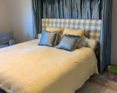 Beautiful bed with canopy and curtains to match. 