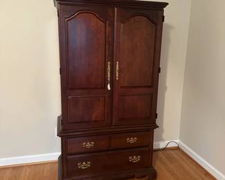 C50 - $150 - American Drew Armoire. Measures 38" wide x 19" deep x 67.5" tall. Top has adjustable shelves and single drawer. Bottom has 2 drawers. All slide easily. Great smaller size!