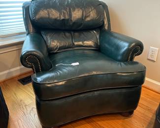 C16 - $175 - Distinction Leather Chair & Ottoman. Dark Green. Measures 34" wide x 38" tall x 32" tall. No holes, rips etc but the leather is showing signs of wear. 
