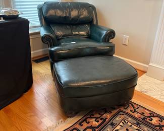C16 - $175 - Distinction Leather Chair & Ottoman. Dark Green. Measures 34" wide x 38" tall x 32" tall. No holes, rips etc but the leather is showing signs of wear. 