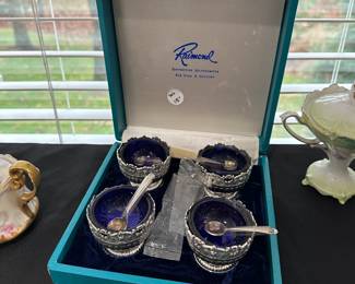 C36 - $15 - Silver plated salt cups & spoons. 