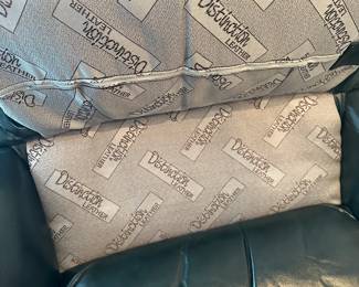 C16 - $175 - Distinction Leather Chair & Ottoman. Dark Green. Measures 34" wide x 38" tall x 32" tall. No holes, rips etc but the leather is showing signs of wear. 