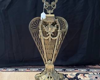 C35 - $75 - Brass folding fire place screen. 