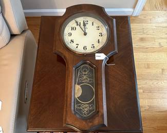 C22 - $40 - Welby Regulator Wall Clock measures 13.5" wide x 28" tall. 
