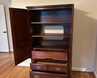 C50 - $150 - American Drew Armoire. Measures 38" wide x 19" deep x 67.5" tall. Top has adjustable shelves and single drawer. Bottom has 2 drawers. All slide easily. Great smaller size!